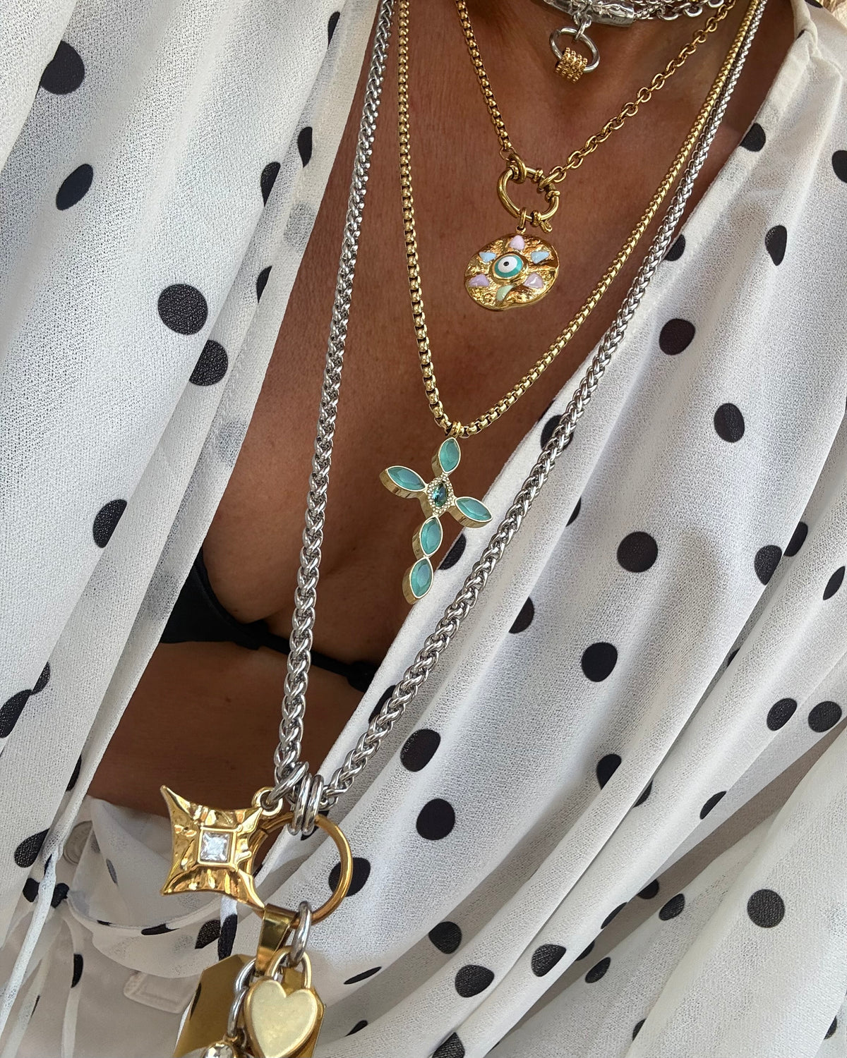 TURQUOISE GLOW CROSS NECKLACE
