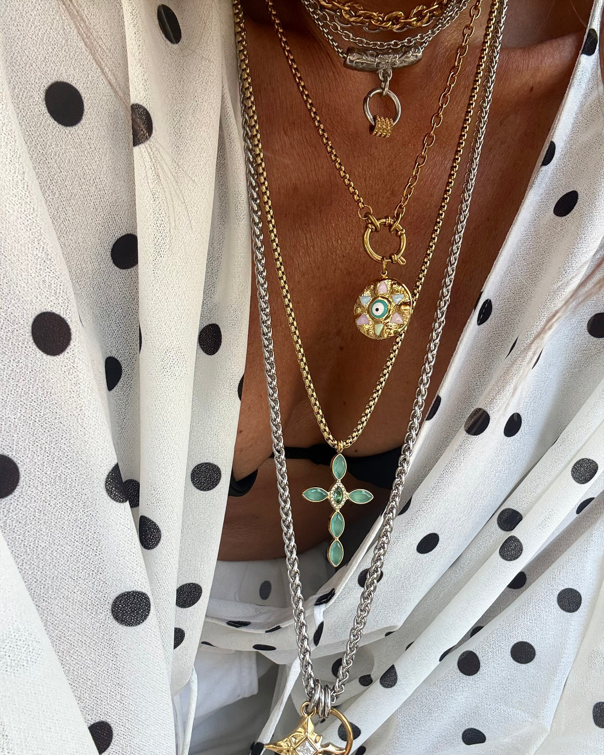 TURQUOISE GLOW CROSS NECKLACE