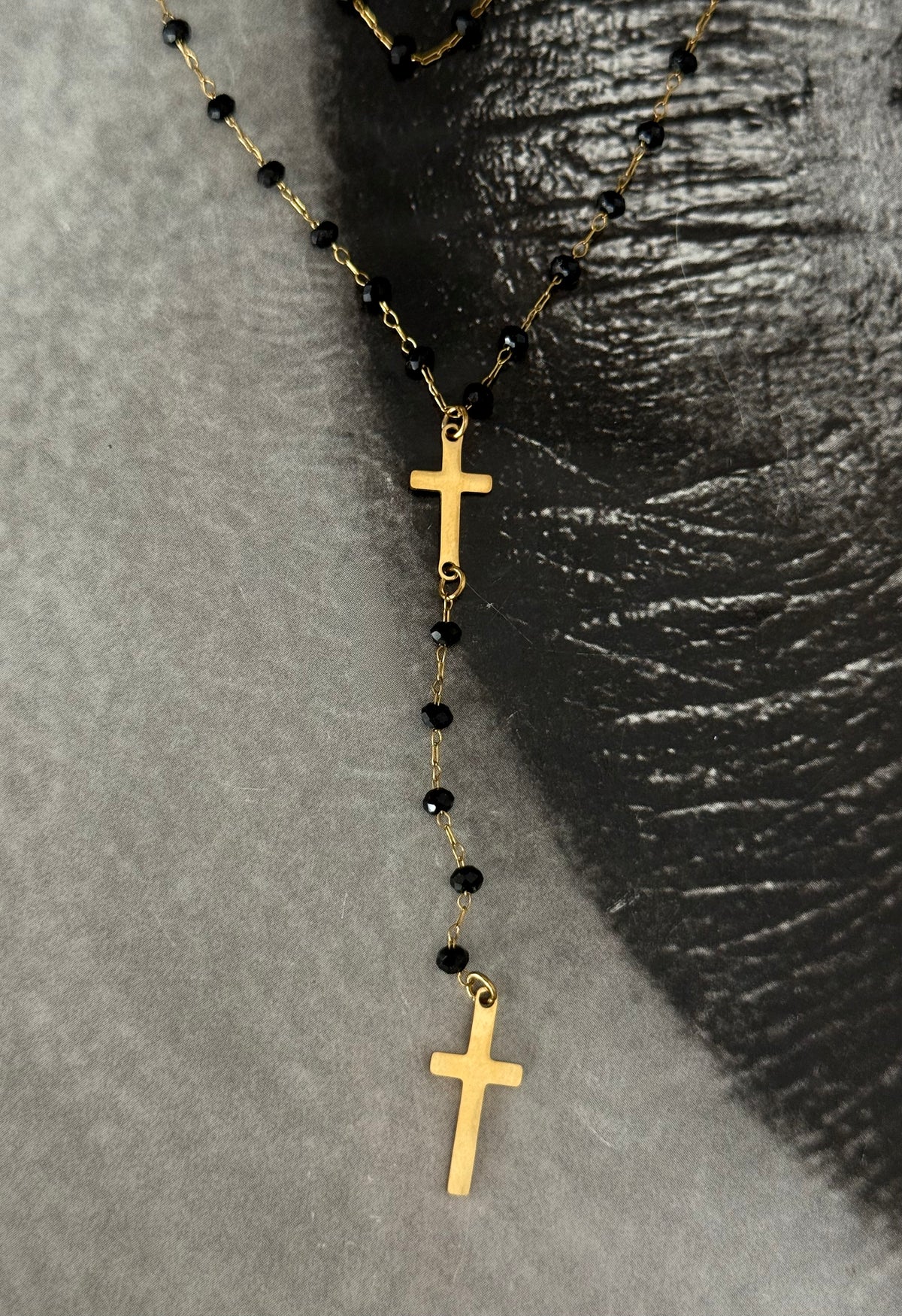 BLACK CROSS TIE NECKLACE